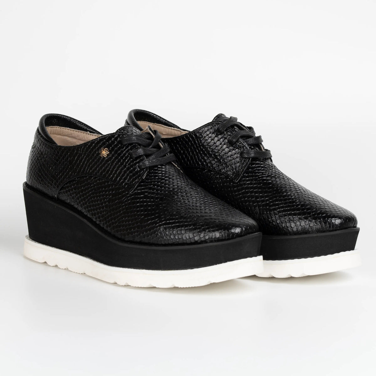 OXFORD NEGRO CON BLANCO CUERO