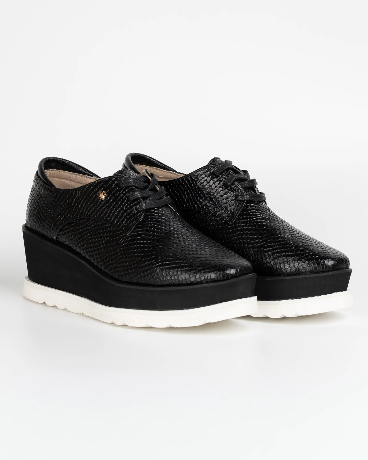 OXFORD NEGRO CON BLANCO CUERO