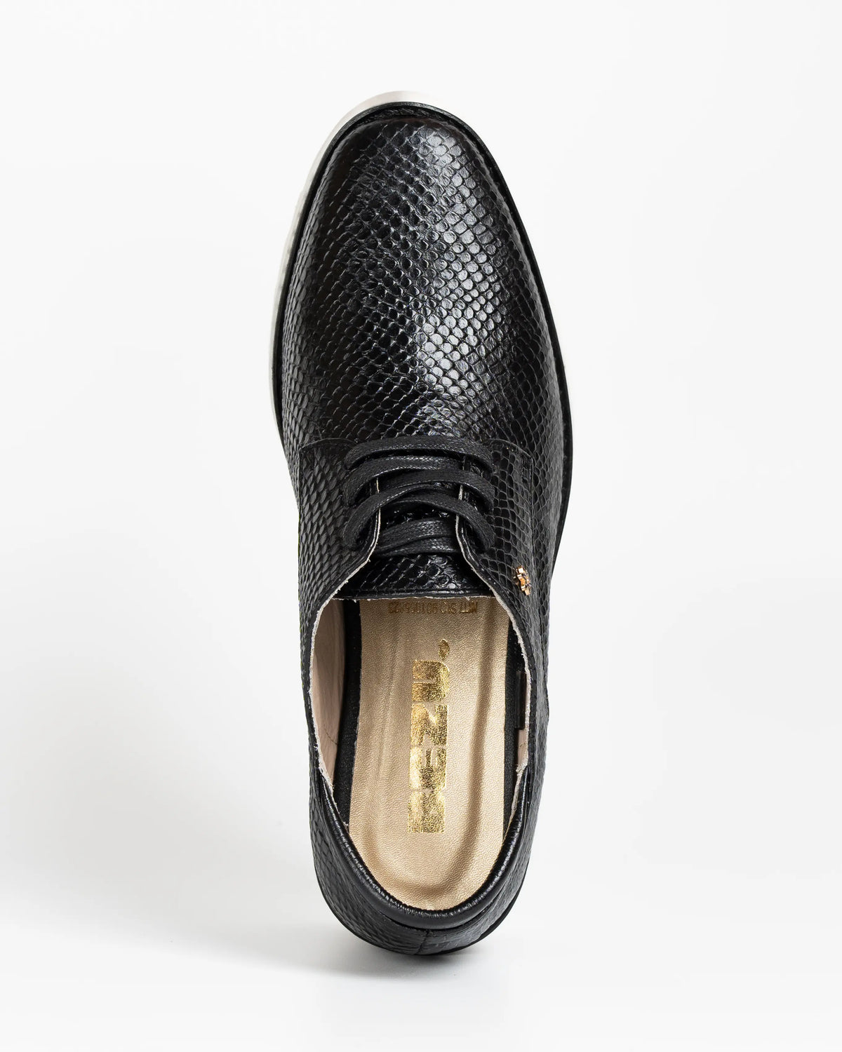 OXFORD NEGRO CON BLANCO CUERO