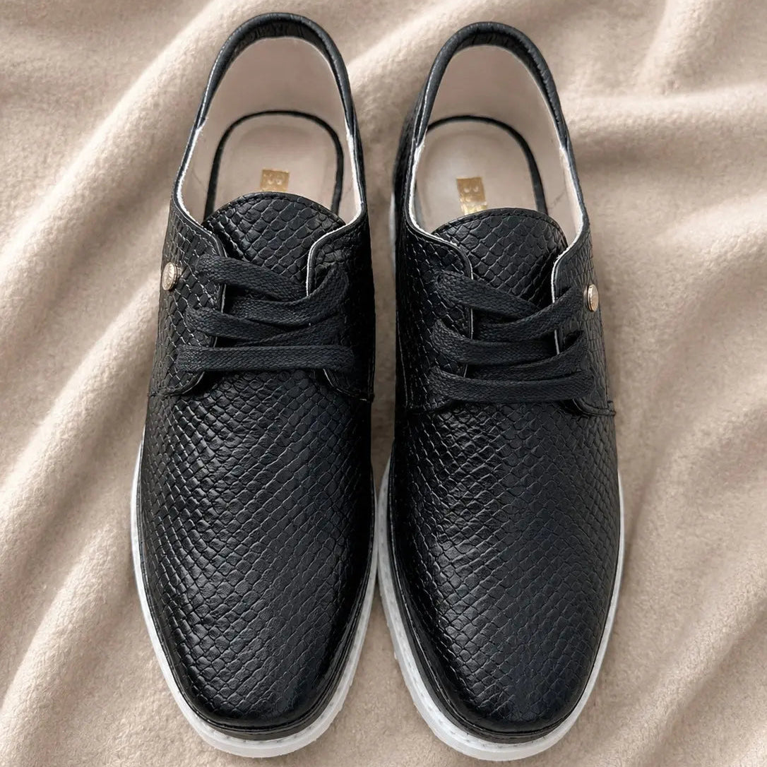 OXFORD NEGRO CON BLANCO CUERO